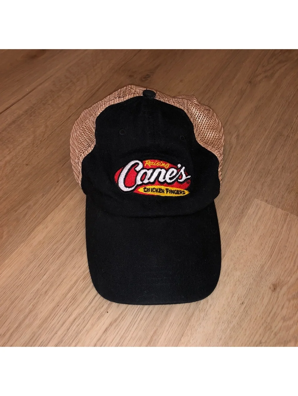 RAISING CANE’S CHICKEN FINGERS MESH BLACK TAN TRUCKER HAT ADJUSTABLE SNAPBACK